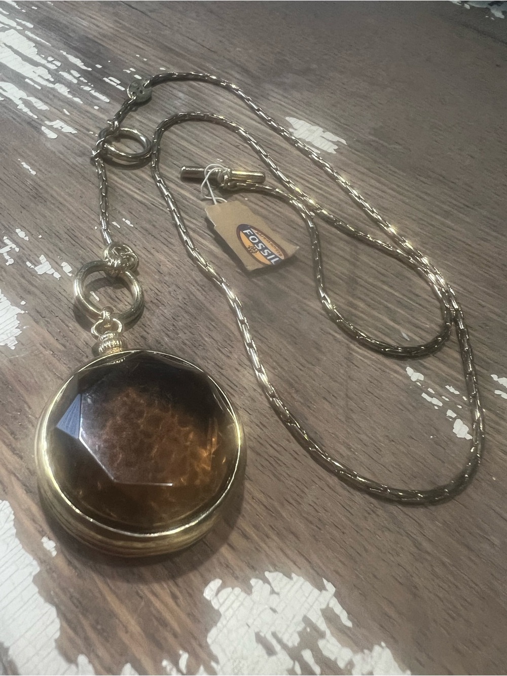 Vintage Fossil amber-brown glass stone and a pocket-watch-inspired necklace